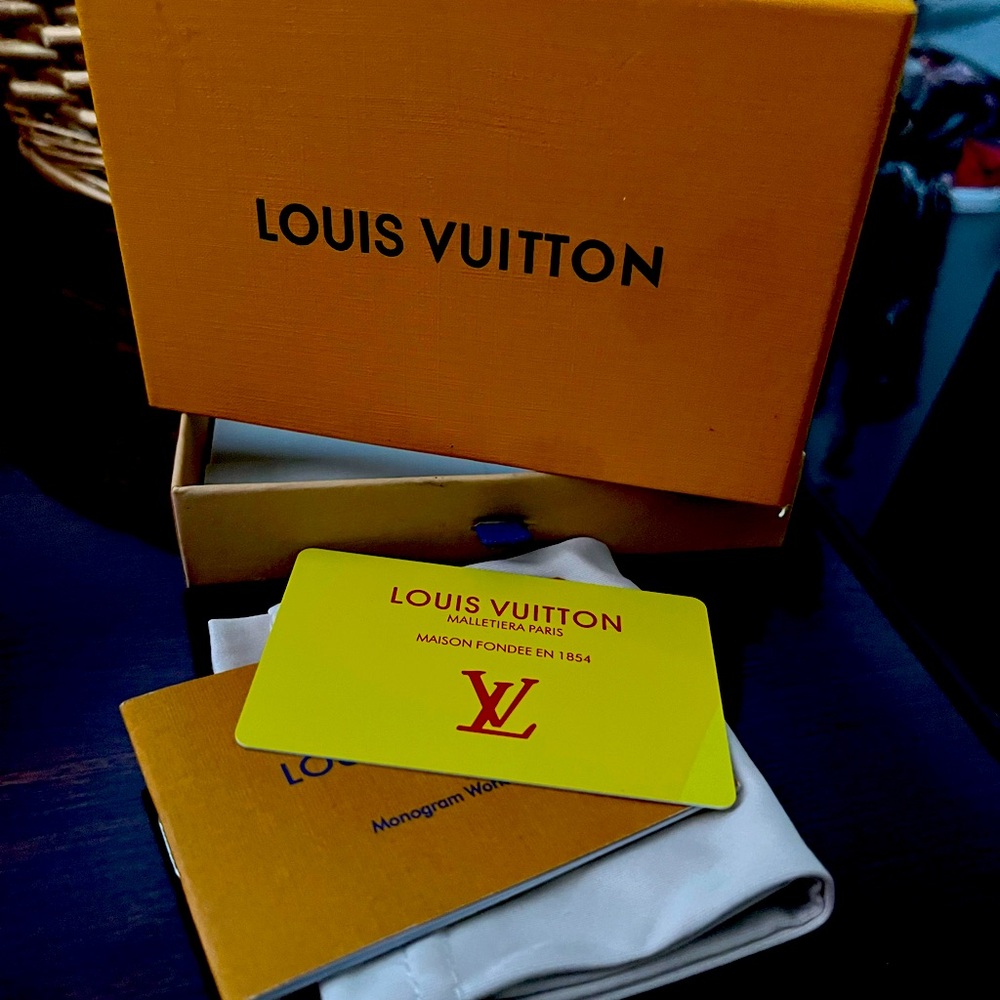 Louis Vuitton box with sash, card and booklet